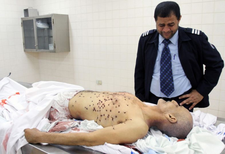 The Arab Revolution, Part 2. u201dIn Bahrain, as in Libya, the government struck back violently against demonstrators, only deepening the crisis. Here a man mourns over a relative who was killed in a clash with riot police.u201d Photo by AFP/Getty Images, u201cIn Focus,u201d The Atlantic, February 21
