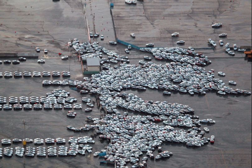 Devastation in Perspective, Part 1. u201dMore than any other medium, photographs excelled at conveying the vastness of the devastation following the tsunami. This aerial shot shows vehicles hurled together in Hitachinaka City.u201d Photo from AFP/Getty Images, u201cBig Pictureu201d, Boston Globe