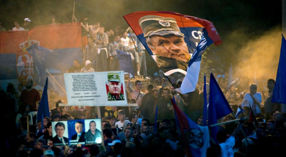 Serbia. ”On Sunday night, thousands of youths gathered in Belgrade to protest the extradition of accused Serbian war criminal Ratko Mladic to The Hague. Mladic, indicted in 1995 by the International Criminal Tribunal for the former Yugoslavia after Serbian forces under his command executed some 8,000 Bosnian Muslim men and boys in the town of Srebrenica, was arrested on May 26 after spending 16 years as a fugitive.” Photo by Andrew Testa, New York Times
