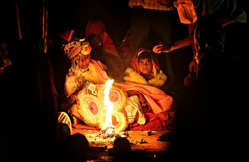 Kaushal and Rajni are seen during their marriage ceremony early in the morning in Rajasthan, India on April 28, 2009. © Stephanie Sinclair / VIIrn