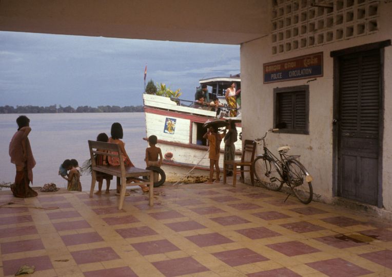 A repatriation ferry on the Mekong River carries 300 former refugees en route to Stung Treng, overnighting at Kampong Cham, during the U.N. brokered elections. May 1993 © Tim Page