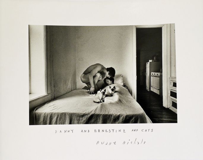 Danny and Ernestine and Their Cats, 1969/c. 1969rnGelatin silver print with hand-applied textrn6 3/4 x 9 7/8 inches (image); 11 x 13 7/8 inches (sheet)rnEdition 11/25rn© Duane Michals. Courtesy of DC Moore Gallery, New York.rn
