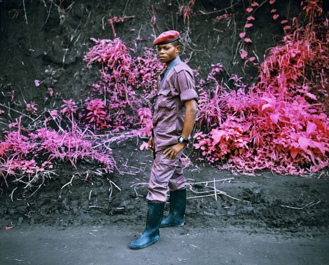 Kodak Aerochrome analogue infrared photo taken in North Kivu, Eastern Congo, in Feb 2010, showing FDLR rebel on day of integration into the Congolese National Army, FARDC.  © Richard Moose
