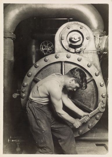 Lewis Hine, Mechanic at the steam pomp in electric power house, circa 1921 © Swann Galleries