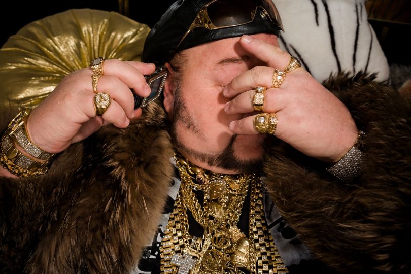PX3 2019 - Photographer of the Year: Lauren Greenfield, Generation Wealth - 
Limo Bob, 49, the self-proclaimed “Limo King,” Chicago, 2008. Bob wears thirty-three pounds of gold and a full-length fur coat given to him by Mike Tyson. His fleet of limousines, including a 100-foot-long Cadillac, are outfitted with crystal chandeliers, Jacuzzis, and stripper poles.