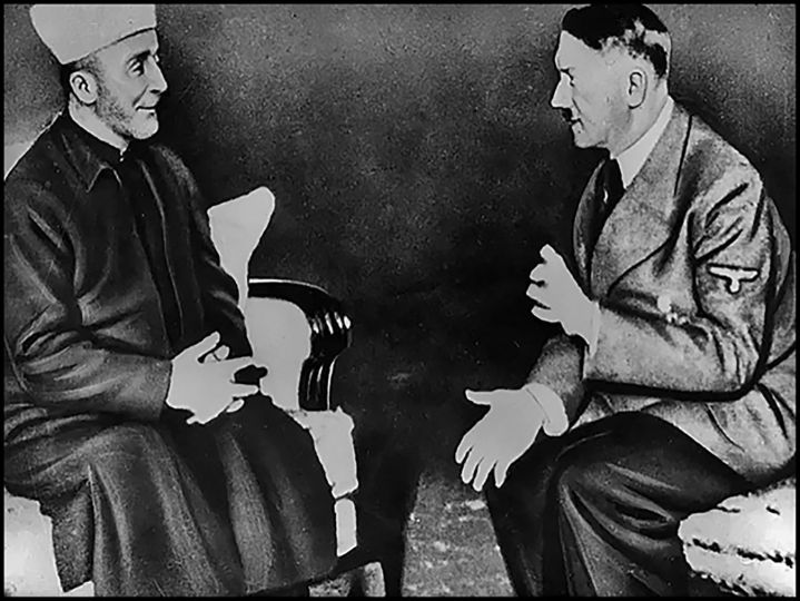 10.09 Unknown photographer. Adolf Hitler talking to Grand Mufti Haj Amin el Husseini, Berlin 1941. Dimensions variable. Gelatin silver print. United States Holocaust Memorial Museum, Washington, DC