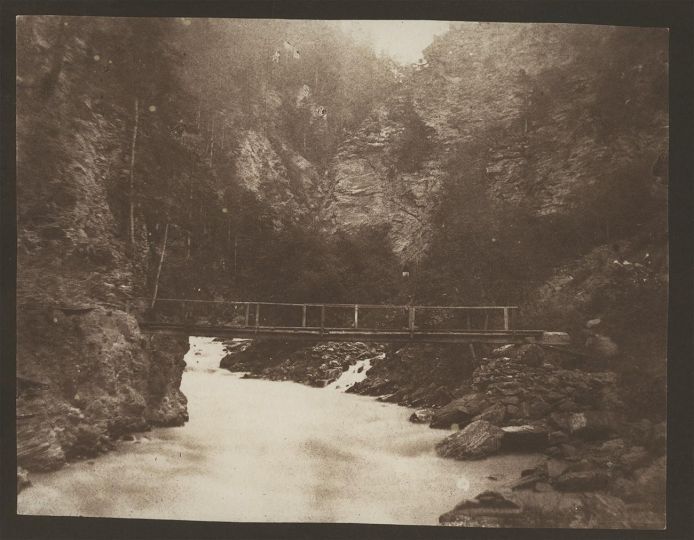 William Henry Fox Talbot (English, 1800-1877)
Rustic bridge across a gorge in Scotland, circa 1844
Salt print from a calotype negative
14.1 x 18.1 cm on 19.7 x 24.1 cm paper - Courtesy of Hans P. Kraus Jr. Fine Photographs 