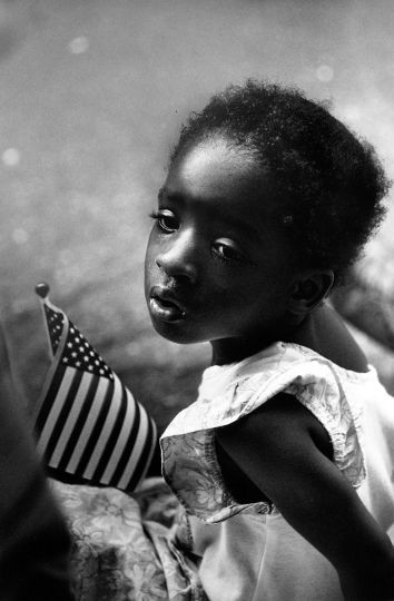 Earlie Hudnall, Jr., Girl with Flag, 1991, Courtesy of PDNB Gallery, Denton, TX