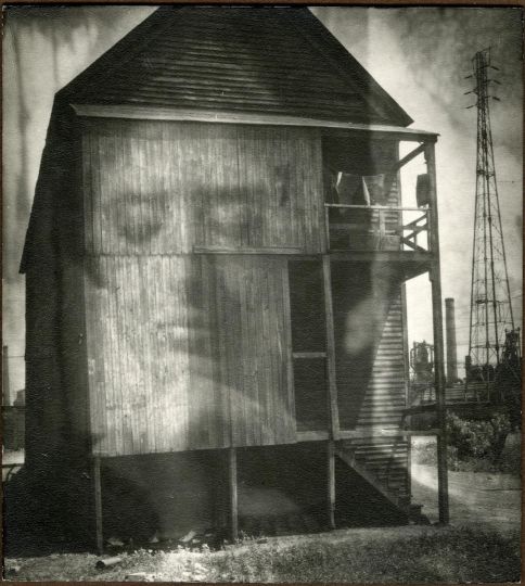 Edmund TESKE (American, 1911-1996) Façade, Chicago (Composite with Shirley Berman), 1956 (rear of house at Chicago Steel Mills taken 1940; portrait of Shirley Berman made in Topanga Canyon, CA, 1956) - Courtesy Deborah Bell Photographs